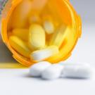Unidentified pills spilling from container
