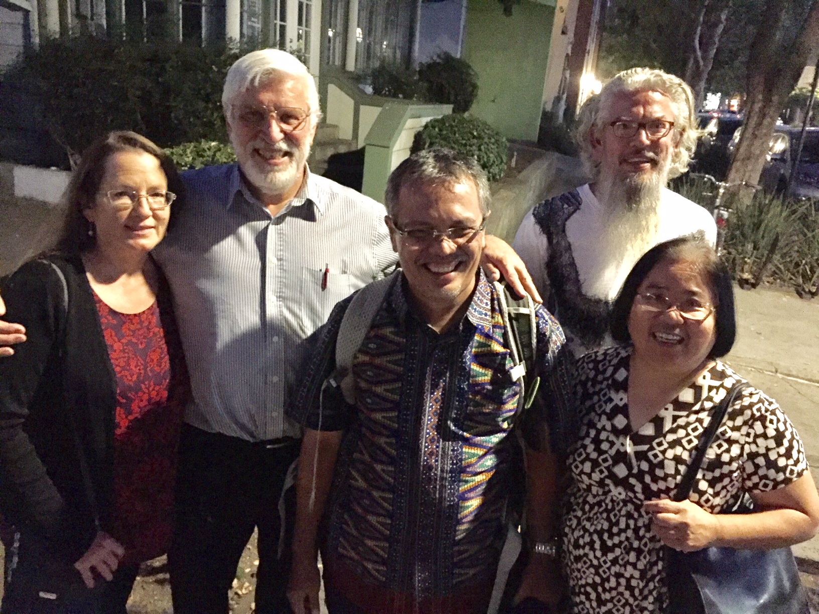 From left to right, Mary Roberts, Jeff Roberts, Jamartin Sihite, Richard Elliott, JoAnn Yee take a moment to snap a group photo during a night on the town in Davis.